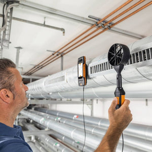 testo 400 air flow kit with 16mm vane probe in use with technician